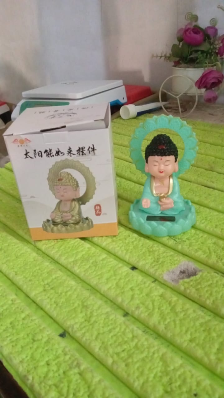 Solar Powered Moving Head Buddha