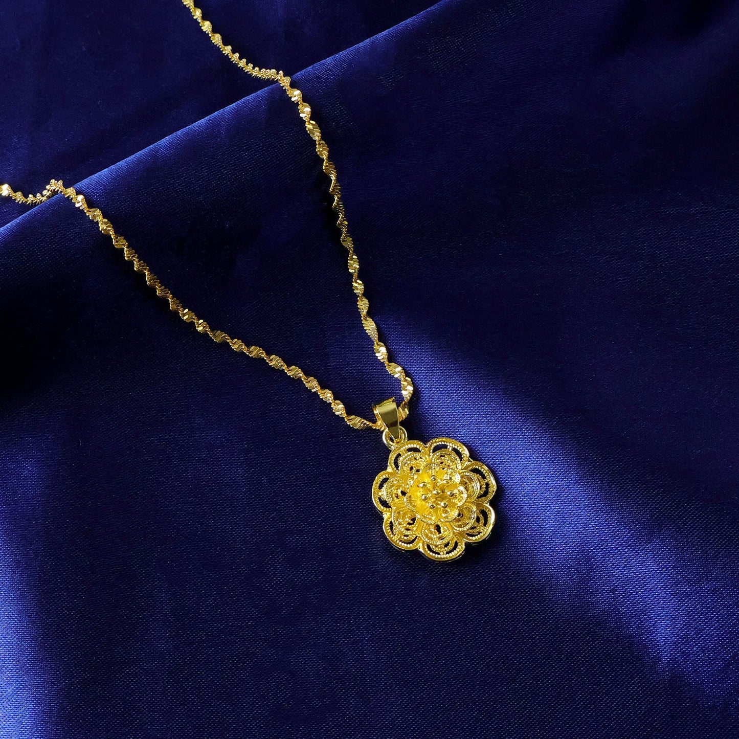 Ethnic style gold plated pendant
